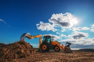 depositphotos 316117926 stock photo wheel loader excavator with field