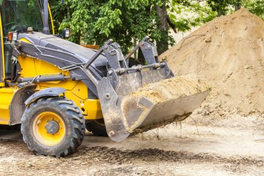 depositphotos 94730008 stock photo excavator at construction site